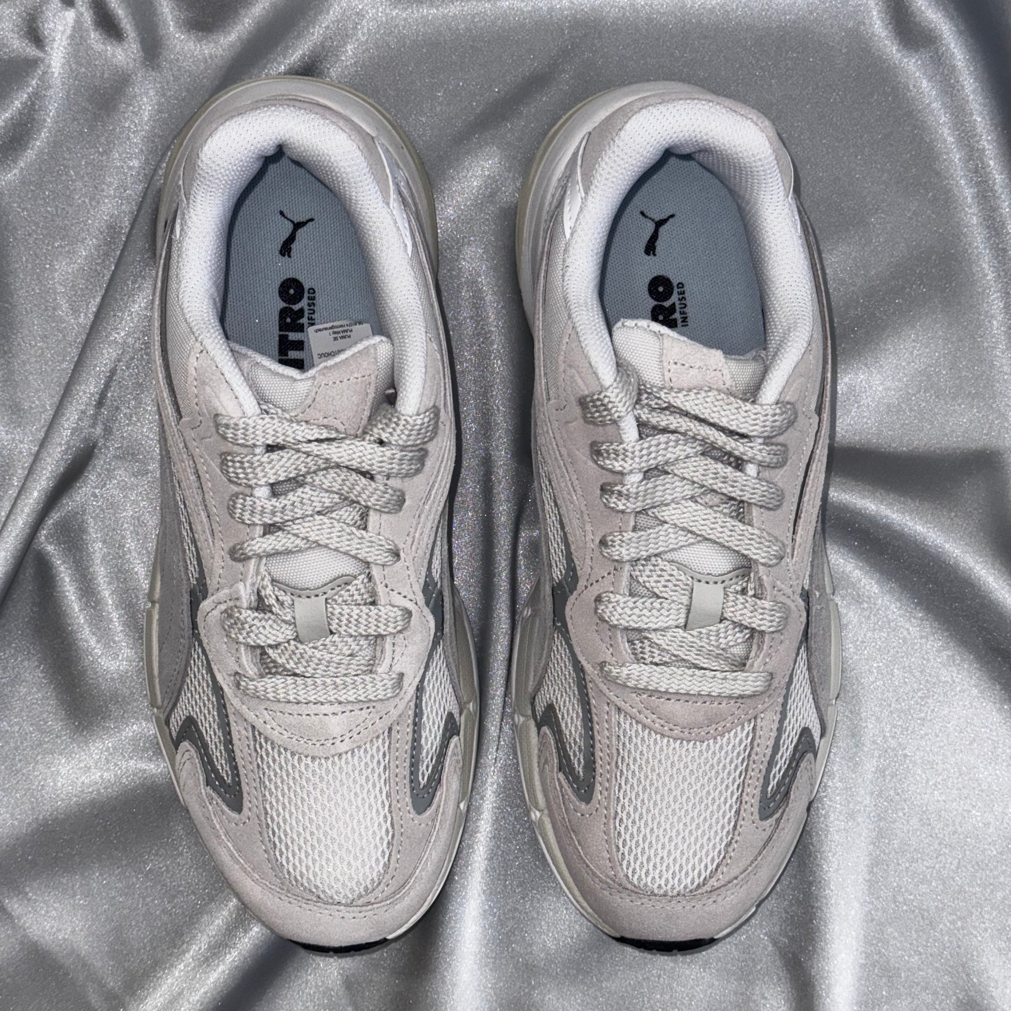 Чоловічі кросівки PUMA Teveris NITRO -світло-сірого кольору, мінімалістичний дизайн, європейський бренд.