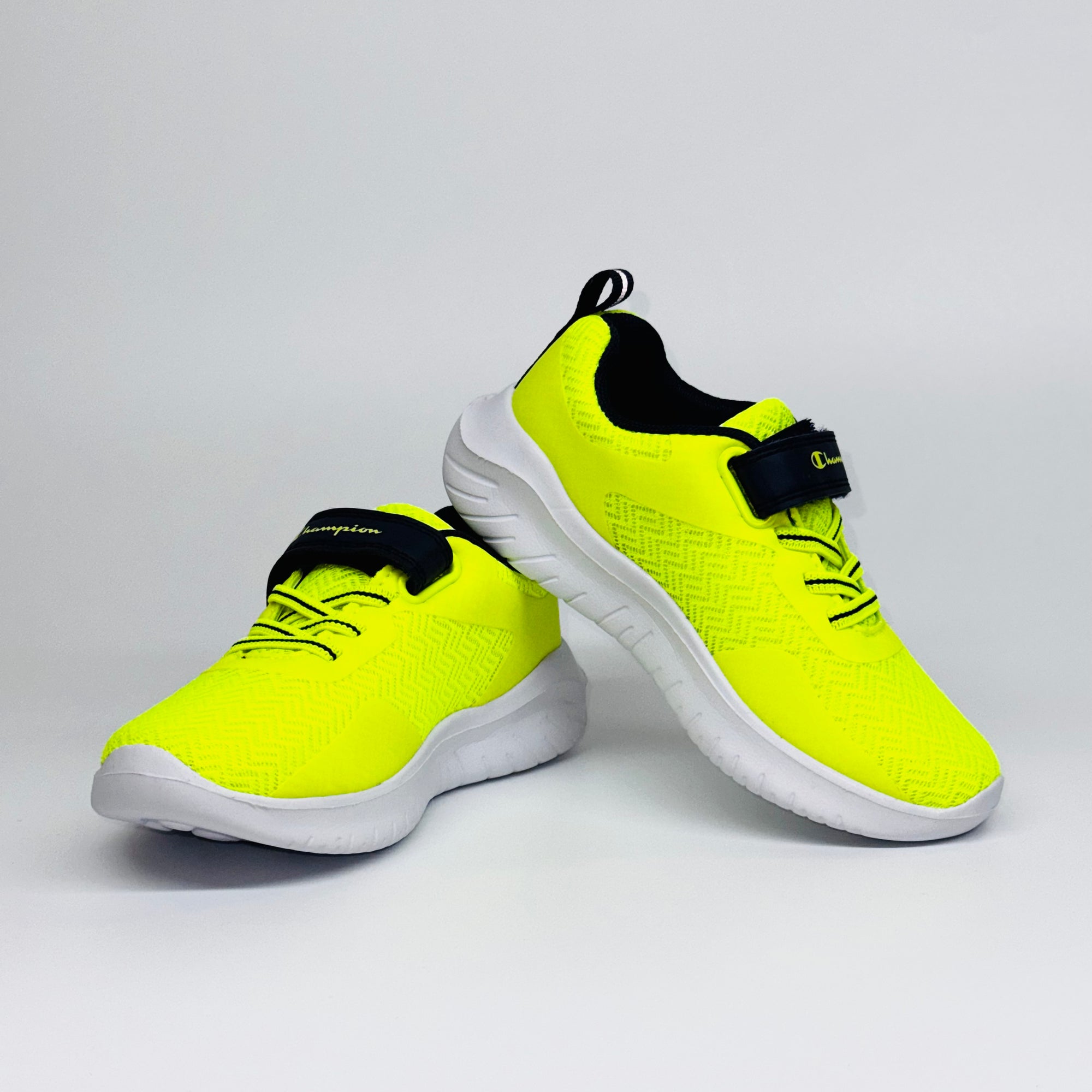 Дитячі кросівки Champion Softy Evolve B Syfnny  неоново-жовтого кольору з чорними вставками, європейський бренд.