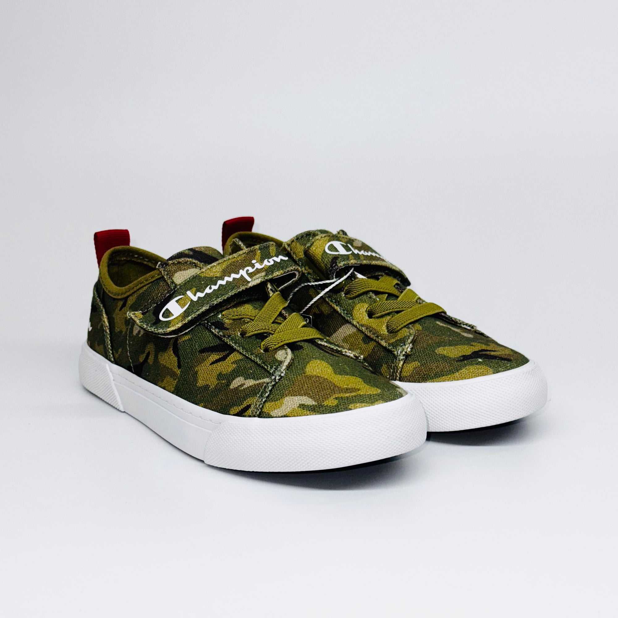 Дитячі кеди Champion Revoli Low B Ps Myg Camo  кольору хакі з білою підошвою, європейський бренд.