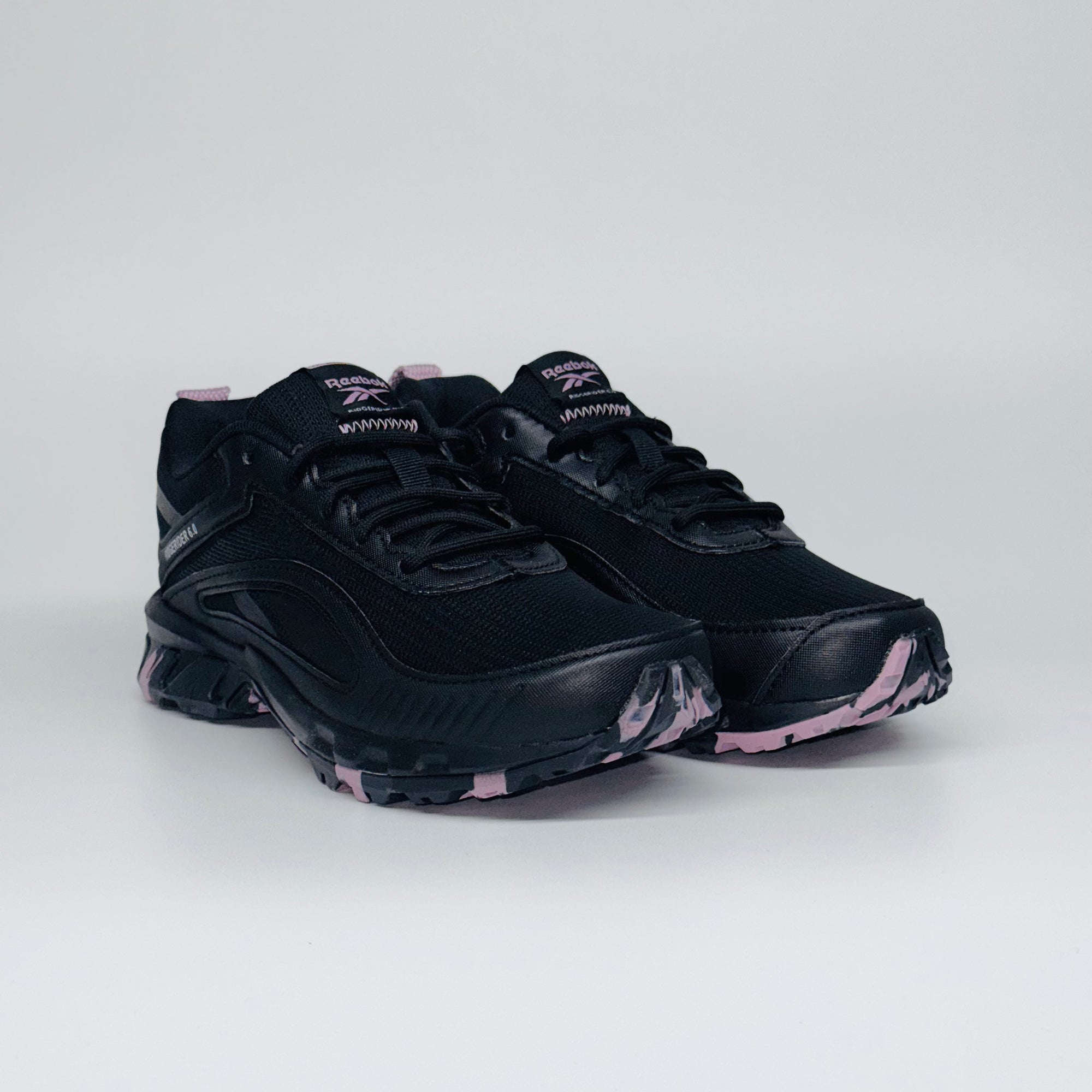 Жіночі кросівки Reebok Ridgerider 6.0 чорні з фіолетовими вставками, європейський бренд.