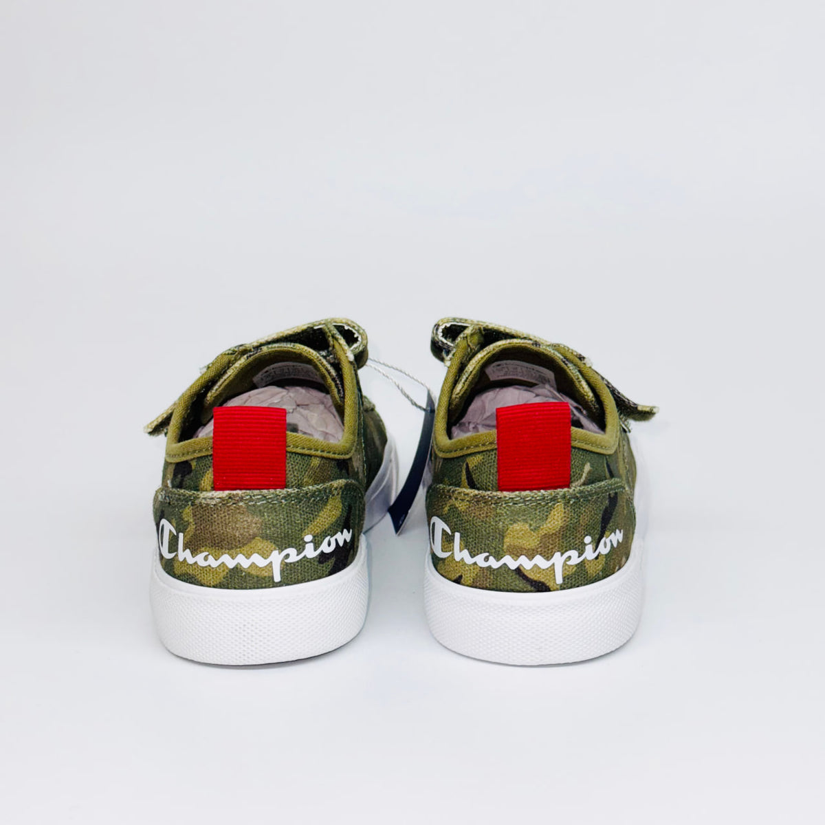 Дитячі кеди Champion Revoli Low B Ps Myg Camo, вигляд ззаду на червону петельку та напис бренду.