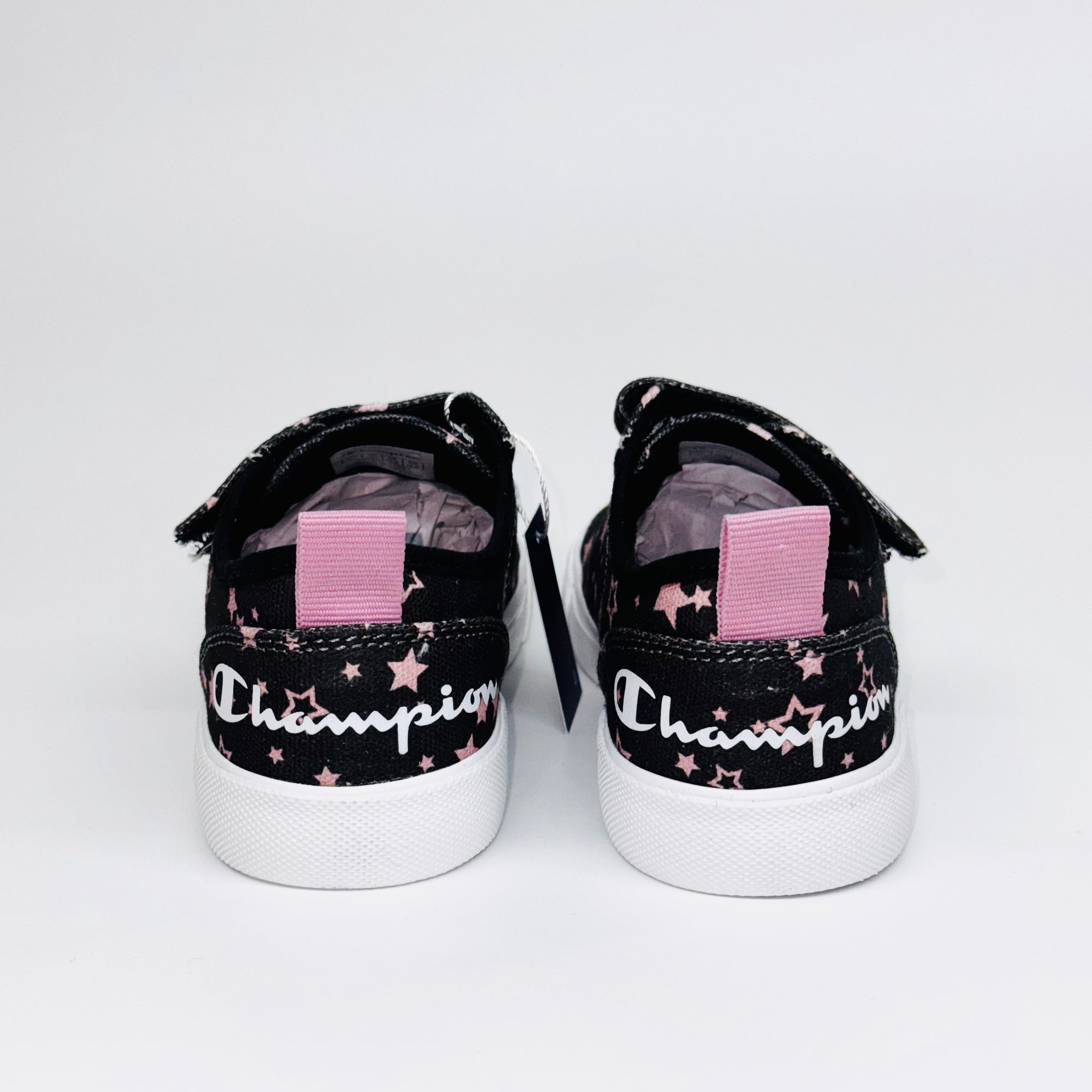 Дитячі кеди Champion Revoli Low G Ps Nbk Print, вигляд ззаду на рожеву петельку та білий напис бренду.