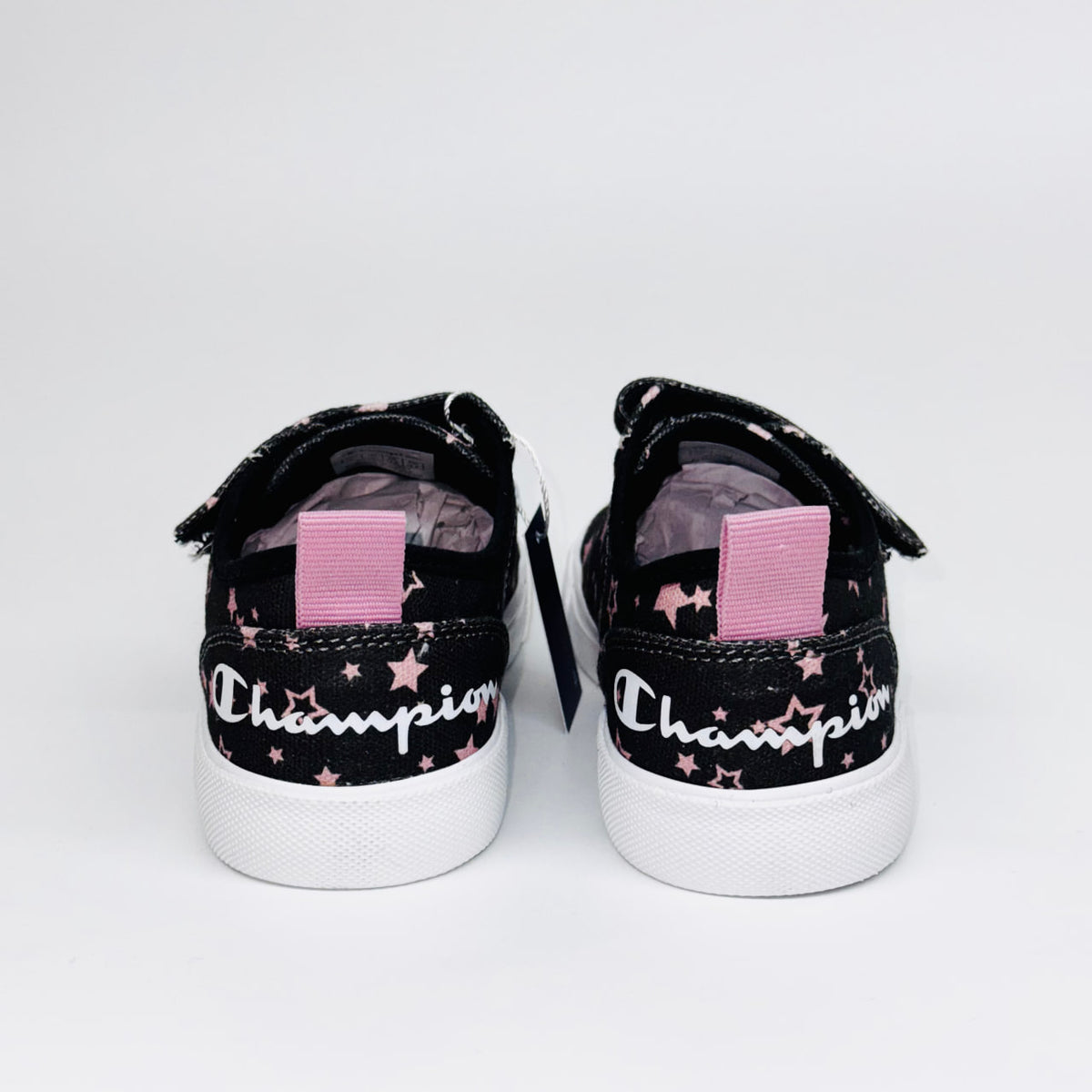 Дитячі кеди Champion Revoli Low G Ps Nbk Print, вигляд ззаду на рожеву петельку та білий напис бренду.