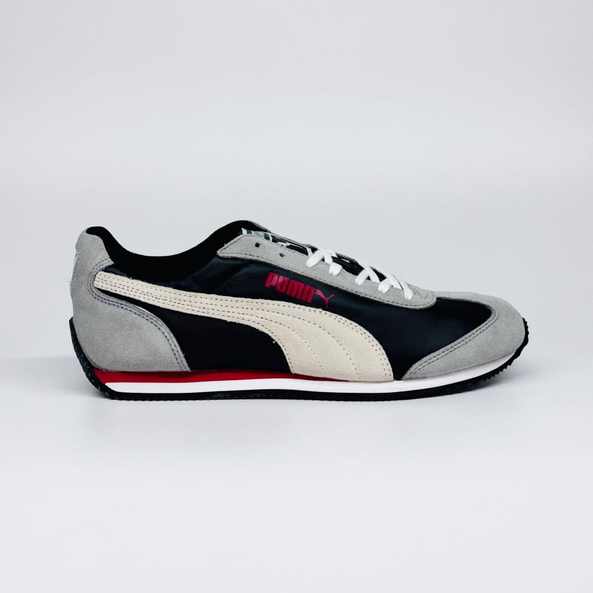 Чоловічі кросівки PUMA RIO SPEED L сірі з чорним, замшеві повсякденні кеди вид збоку.